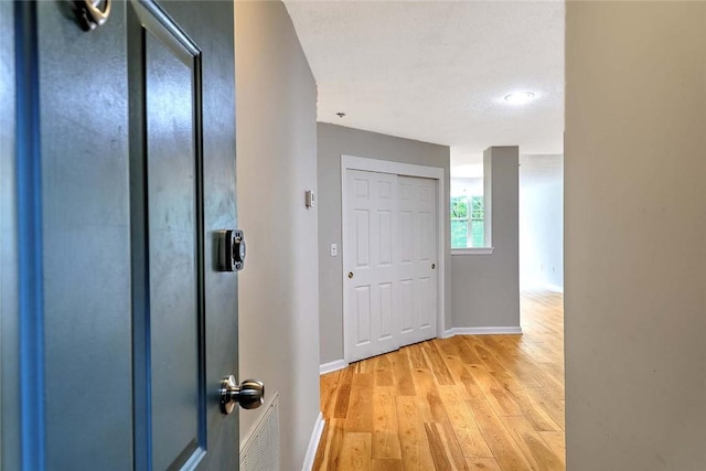 2 School St Unit 334, Lincoln, RI 02802 - hall featuring baseboards and light wood-type flooring