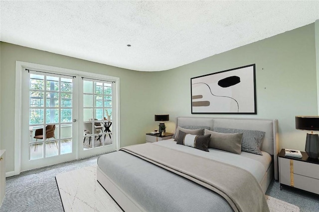 2 School St Unit 334, Lincoln, RI 02802 - bedroom with light carpet and a textured ceiling
