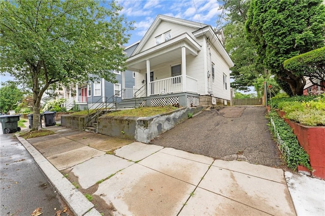31 Stadden St, Providence, RI 02907 - view of front of property with a porch and driveway