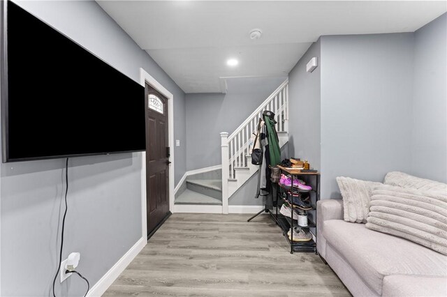 31 Stadden St, Providence, RI 02907 - foyer entrance with stairway, light wood finished floors, and recessed lighting