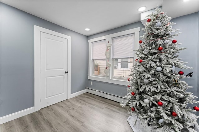 31 Stadden St, Providence, RI 02907 - interior space featuring baseboard heating, wood finished floors, and recessed lighting