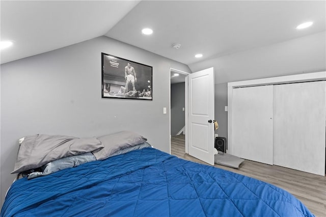 31 Stadden St, Providence, RI 02907 - bedroom with wood finished floors, lofted ceiling, a closet, and recessed lighting