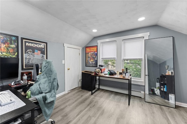 31 Stadden St, Providence, RI 02907 - office area featuring baseboard heating, vaulted ceiling, and wood finished floors