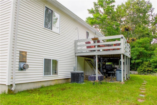 14 Drawbridge Dr, West Warwick, RI 02893 - back of property with a deck and a lawn