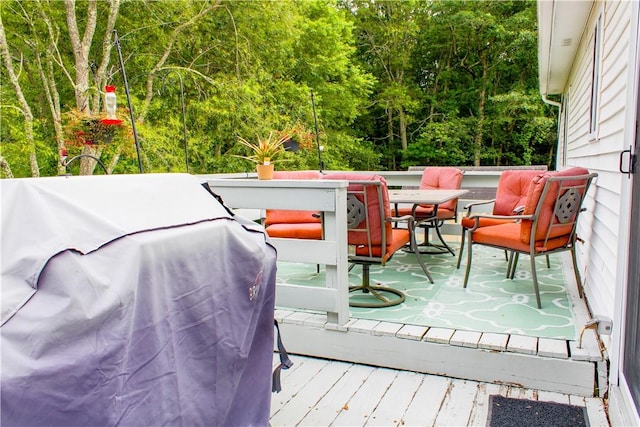 14 Drawbridge Dr, West Warwick, RI 02893 - deck featuring area for grilling, outdoor dining space, and a view of trees