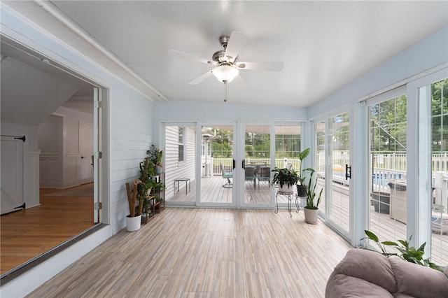 15 Bestwick Trl, Coventry, RI 02816 - sunroom with a ceiling fan, wood finished floors, and a deck