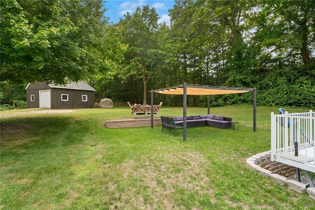 15 Bestwick Trl, Coventry, RI 02816 - view of green lawn with an outdoor structure, an outdoor hangout area, and a detached garage
