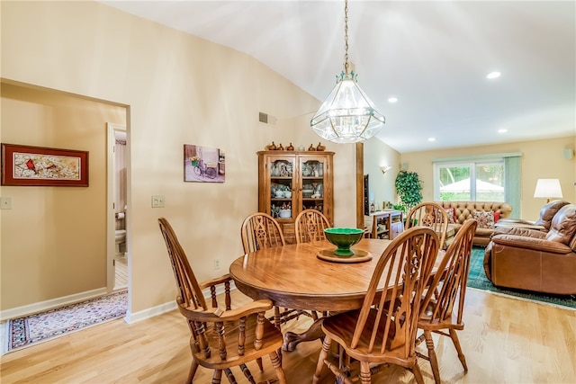 125 Smith Ave Unit 4C, Smithfield, RI 02828 - dining area featuring vaulted ceiling, a chandelier, light wood-style flooring, and recessed lighting