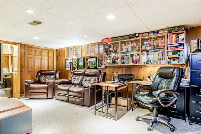 125 Smith Ave Unit 4C, Smithfield, RI 02828 - home office with a paneled ceiling, carpet flooring, and wood walls
