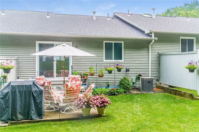125 Smith Ave Unit 4C, Smithfield, RI 02828 - back of property featuring roof with shingles and a lawn