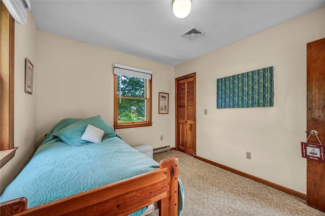 146 Balsam Rd, South Kingstown, RI 02879 - bedroom featuring carpet floors, baseboard heating, and a closet