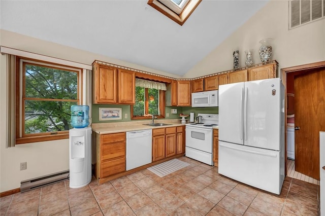 146 Balsam Rd, South Kingstown, RI 02879 - kitchen featuring white appliances, a skylight, baseboard heating, light countertops, and vaulted ceiling