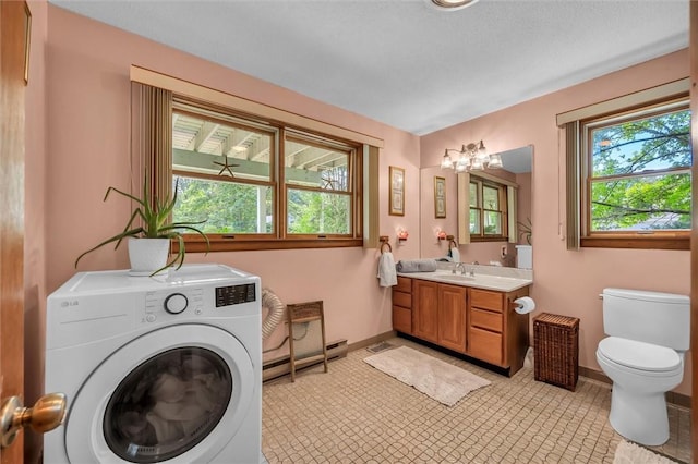 146 Balsam Rd, South Kingstown, RI 02879 - laundry area featuring washer / clothes dryer and a baseboard heating unit