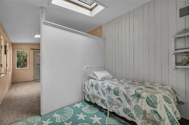 146 Balsam Rd, South Kingstown, RI 02879 - carpeted bedroom with a skylight and wooden walls