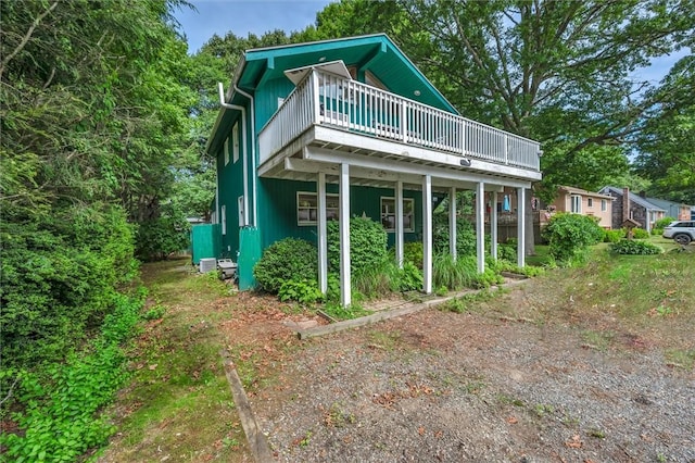 146 Balsam Rd, South Kingstown, RI 02879 - rear view of house featuring a wooden deck
