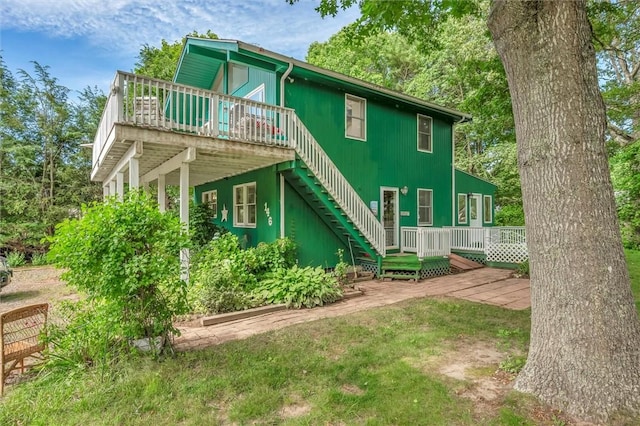 146 Balsam Rd, South Kingstown, RI 02879 - rear view of house with a deck, stairway, and a patio area