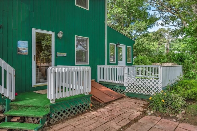 146 Balsam Rd, South Kingstown, RI 02879 - property entrance with a wooden deck