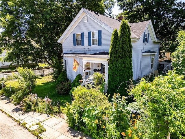 36 Gardner Ave, West Warwick, RI 02893 - traditional home featuring a chimney and roof with shingles