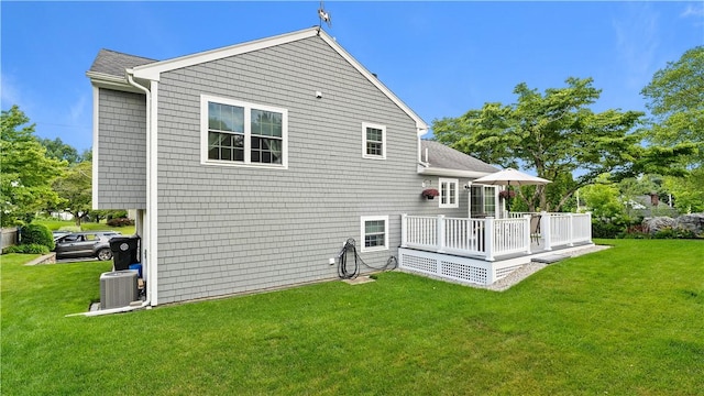 24 Mello St, West Warwick, RI 02893 - back of property featuring a deck and a yard