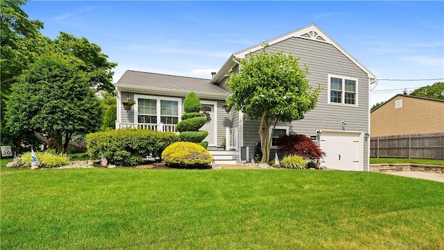 24 Mello St, West Warwick, RI 02893 - view of front of home featuring a garage