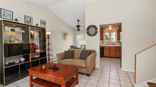 24 Mello St, West Warwick, RI 02893 - living area featuring light tile patterned flooring, ceiling fan, baseboard heating, and high vaulted ceiling