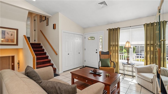 24 Mello St, West Warwick, RI 02893 - living area featuring lofted ceiling, light tile patterned flooring, a baseboard radiator, and stairway
