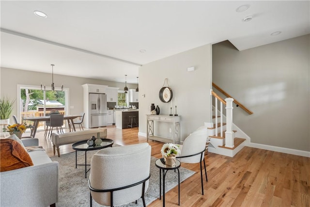 156 Potter St, Cranston, RI 02910 - living room featuring stairs, light wood-type flooring, and recessed lighting
