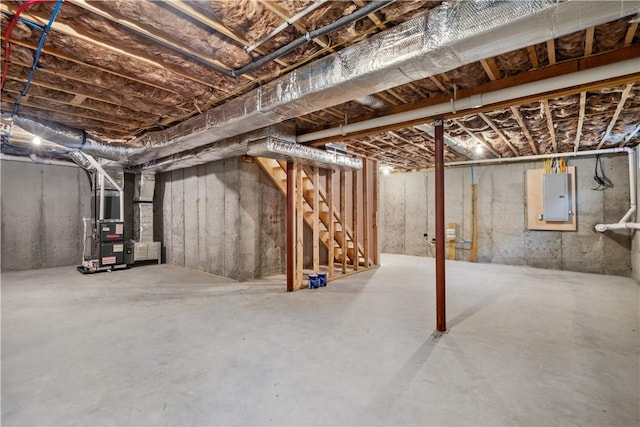 156 Potter St, Cranston, RI 02910 - unfinished below grade area featuring electric panel and heating unit