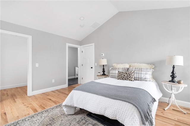 119 Myrtle Ave, Cranston, RI 02910 - bedroom with vaulted ceiling and light wood-type flooring