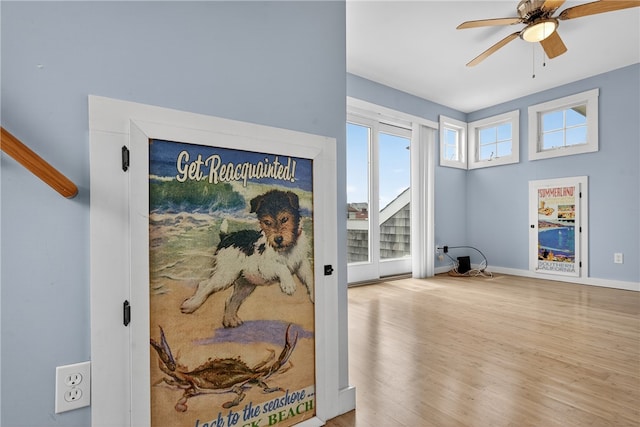 1 Barney Ave, South Kingstown, RI 02879 - detailed view of a ceiling fan and wood finished floors