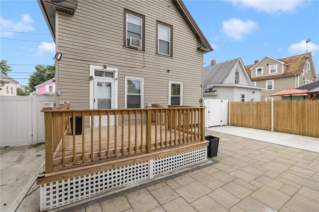 155 Early St, Providence, RI 02907 - rear view of property with a patio area, a fenced backyard, and a deck