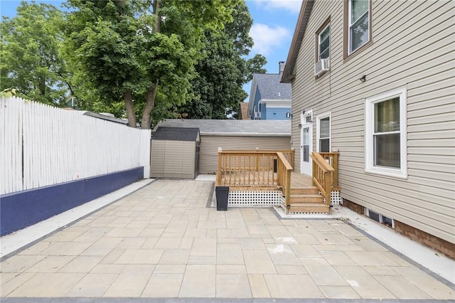 155 Early St, Providence, RI 02907 - view of patio / terrace with a deck and a storage unit