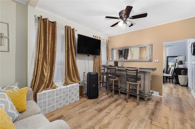 155 Early St, Providence, RI 02907 - living room with wood finished floors, a ceiling fan, and ornamental molding
