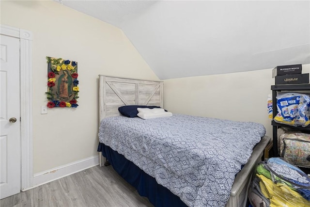 155 Early St, Providence, RI 02907 - bedroom with wood finished floors and vaulted ceiling