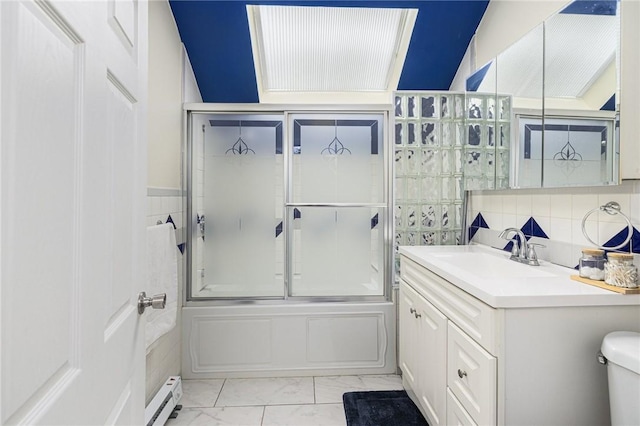 155 Early St, Providence, RI 02907 - full bathroom with vanity, bath / shower combo with glass door, marble finish flooring, tile walls, and backsplash