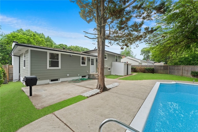 19 Cushing Rd, Warwick, RI 02888 - rear view of house with a patio area, a fenced backyard, and entry steps
