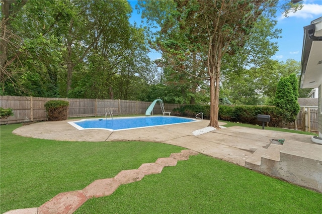 19 Cushing Rd, Warwick, RI 02888 - view of pool featuring a water slide, a fenced backyard, and a patio area
