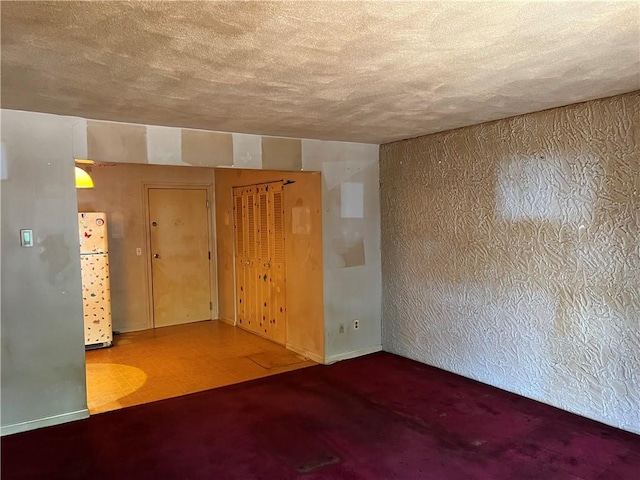1190 Charles St Unit 21, North Providence, RI 02904 - unfurnished room featuring a textured ceiling