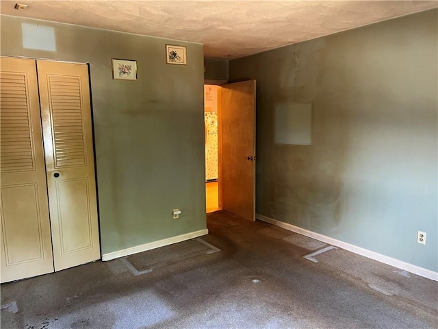 1190 Charles St Unit 21, North Providence, RI 02904 - unfurnished bedroom with a closet and carpet flooring