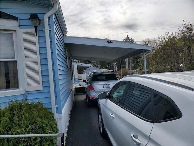 26 Lane E, Coventry, RI 02816 - view of vehicle parking with a carport