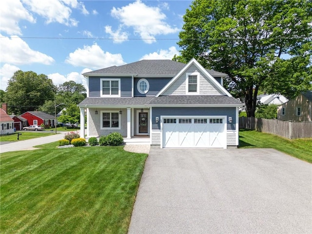 96 Evergreen St, Cumberland, RI 02864 - view of front of house with asphalt driveway, covered porch, and roof with shingles