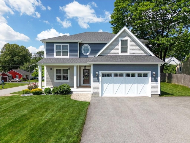 96 Evergreen St, Cumberland, RI 02864 - view of front of home featuring asphalt driveway, covered porch, roof with shingles, and an attached garage