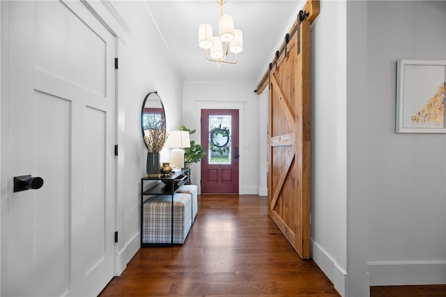 96 Evergreen St, Cumberland, RI 02864 - entryway featuring a barn door, wood finished floors, and crown molding