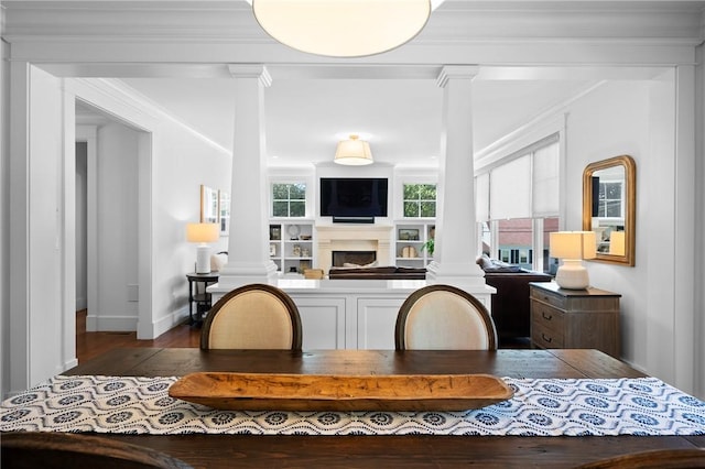 96 Evergreen St, Cumberland, RI 02864 - office area with decorative columns, wood-type flooring, a fireplace, and crown molding