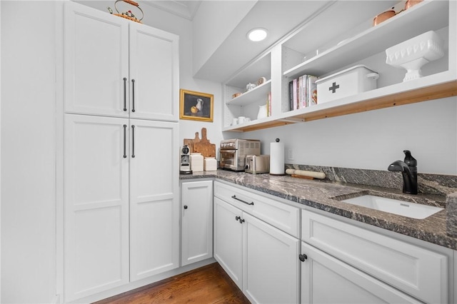 96 Evergreen St, Cumberland, RI 02864 - kitchen featuring open shelves, dark stone counters, white cabinetry, and dark wood-type flooring