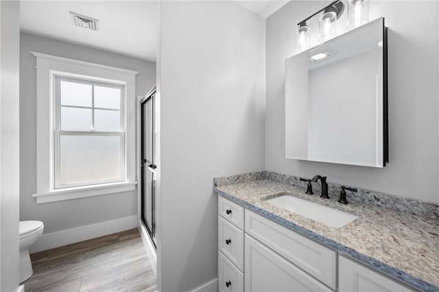 96 Evergreen St, Cumberland, RI 02864 - full bath featuring vanity, a shower stall, and wood finished floors
