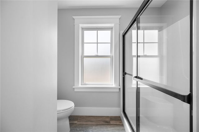 96 Evergreen St, Cumberland, RI 02864 - bathroom with a stall shower and wood finished floors