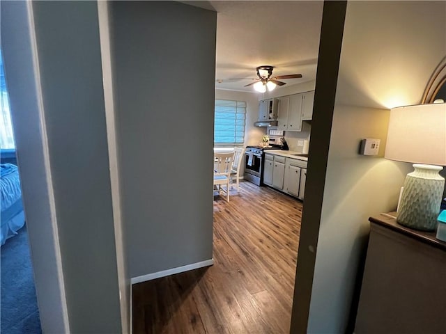 494 Putnam Pike Unit A12, Smithfield, RI 02828 - hallway featuring wood finished floors and baseboards