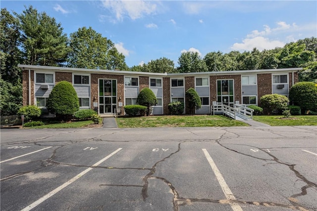 494 Putnam Pike Unit A12, Smithfield, RI 02828 - view of property featuring uncovered parking