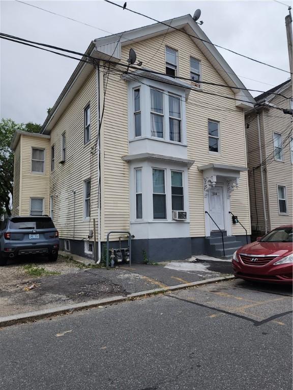 136 W Clifford St, Providence, RI 02907 - view of front of property featuring entry steps and cooling unit